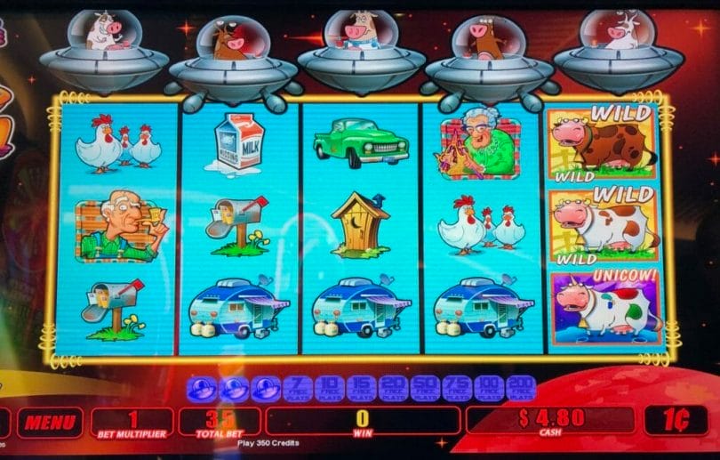 Slot machine with cartoon farm theme.