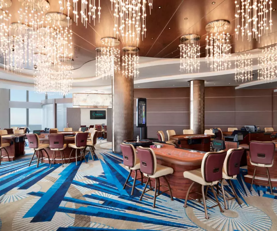 Elegant casino interior with modern chandeliers.
