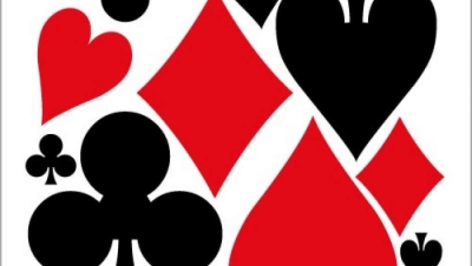 Playing card suits: hearts, diamonds, clubs, spades.