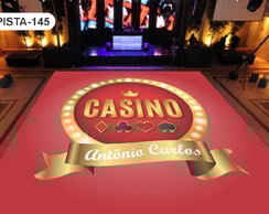 Casino-themed event floor with decorative logo.